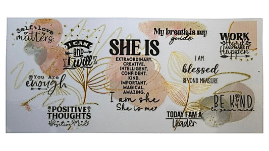 She Is..